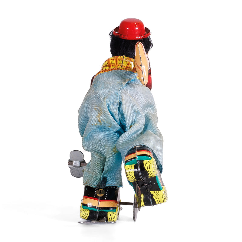 TPS Japan Wind Up Roller Skating Clown : Works!