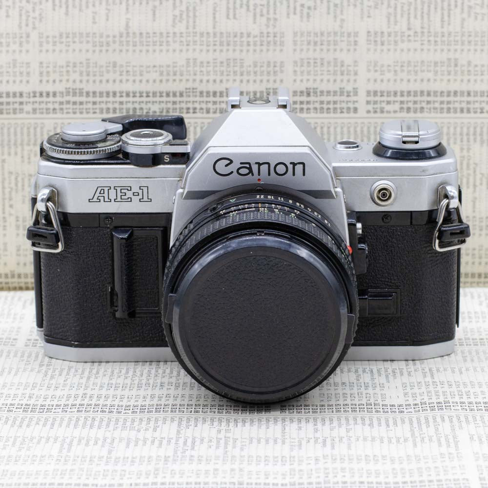 Canon AE-1 with Motor Drive & Canon FD 50mm f1.8 Lens – Everything