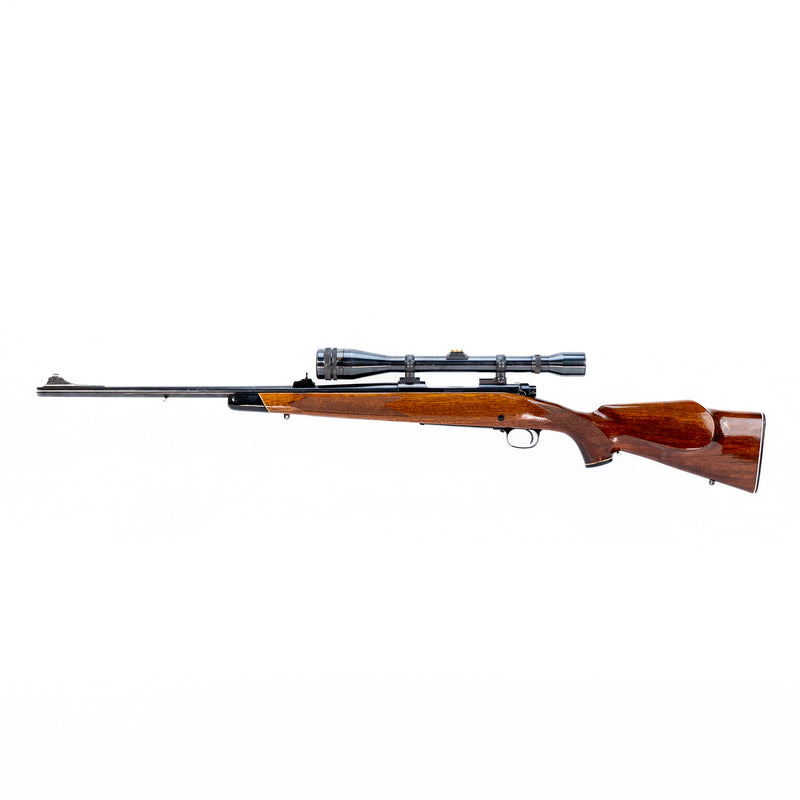 Winchester Model 70 Bolt Action Rifle with Weaver K12X Scope