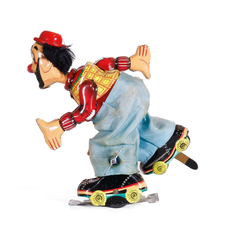 TPS Japan Wind Up Roller Skating Clown : Works!