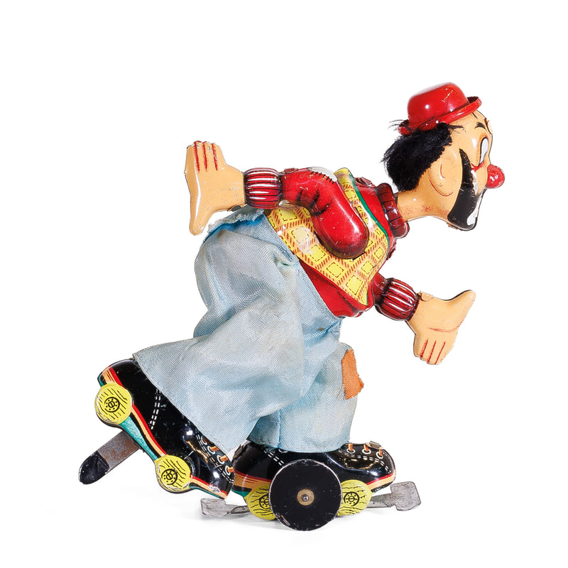 TPS Japan Wind Up Roller Skating Clown : Works!