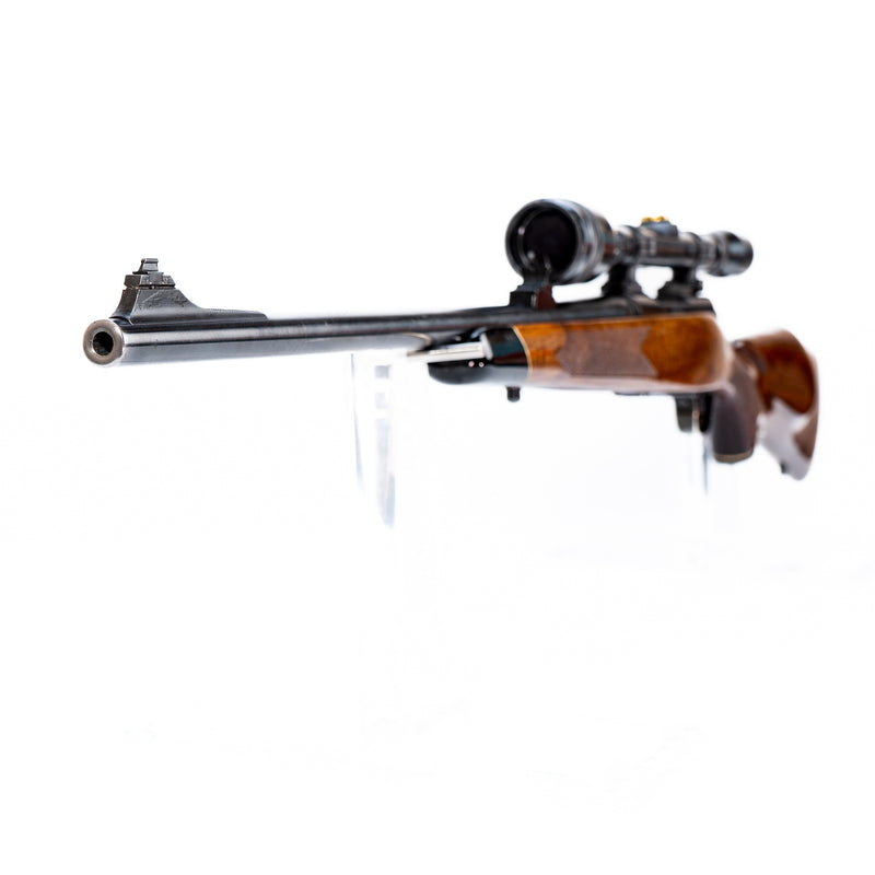 Winchester Model 70 Bolt Action Rifle with Weaver K12X Scope